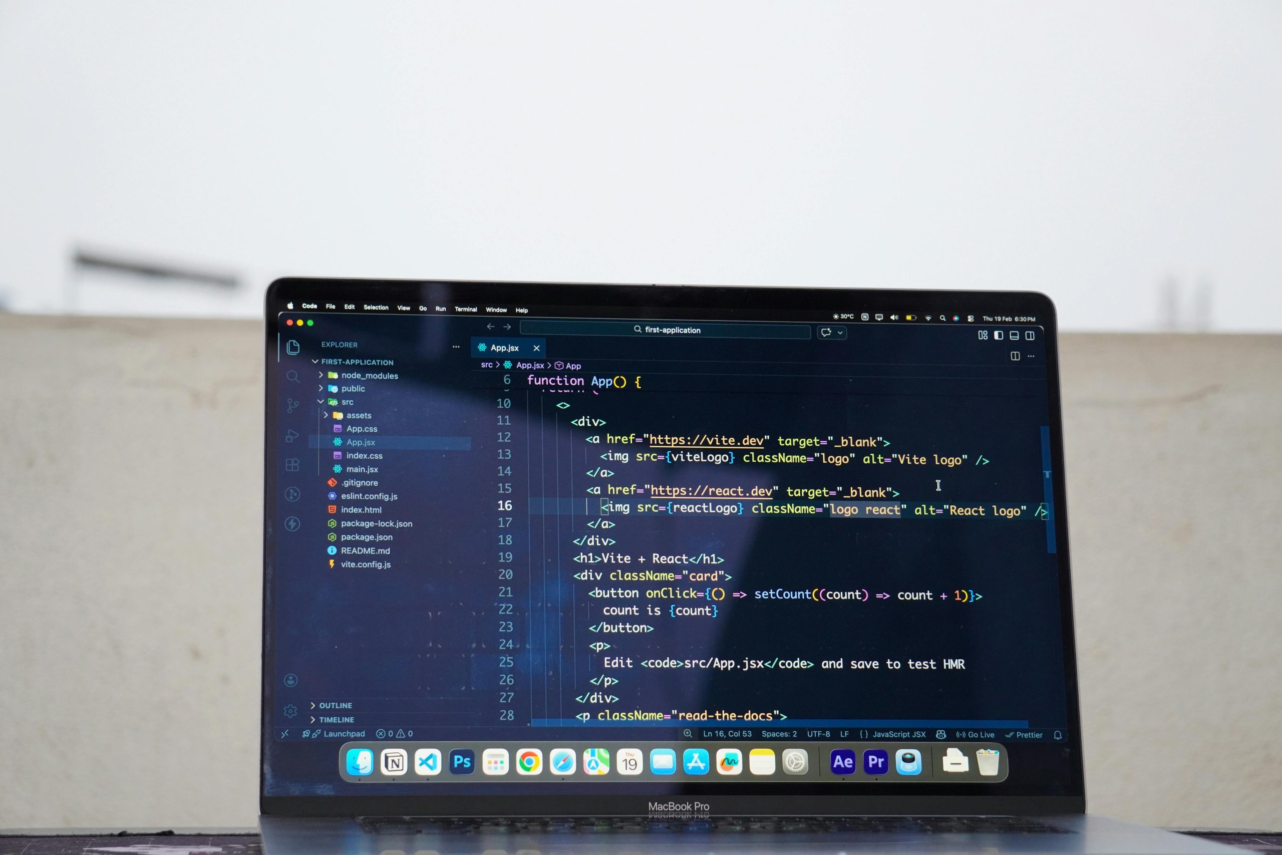 Laptop displaying code outdoors, ideal for remote work or freelance programming.