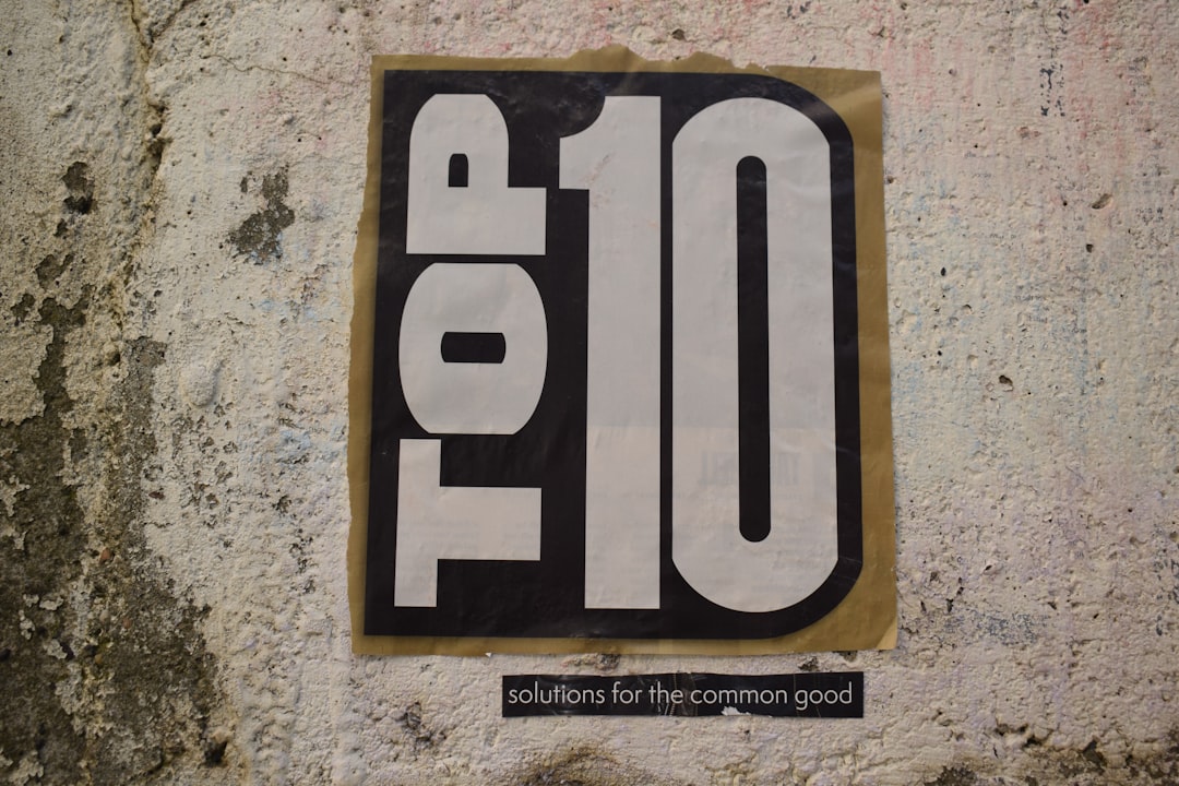 a sticker on the side of a building that says 10 10